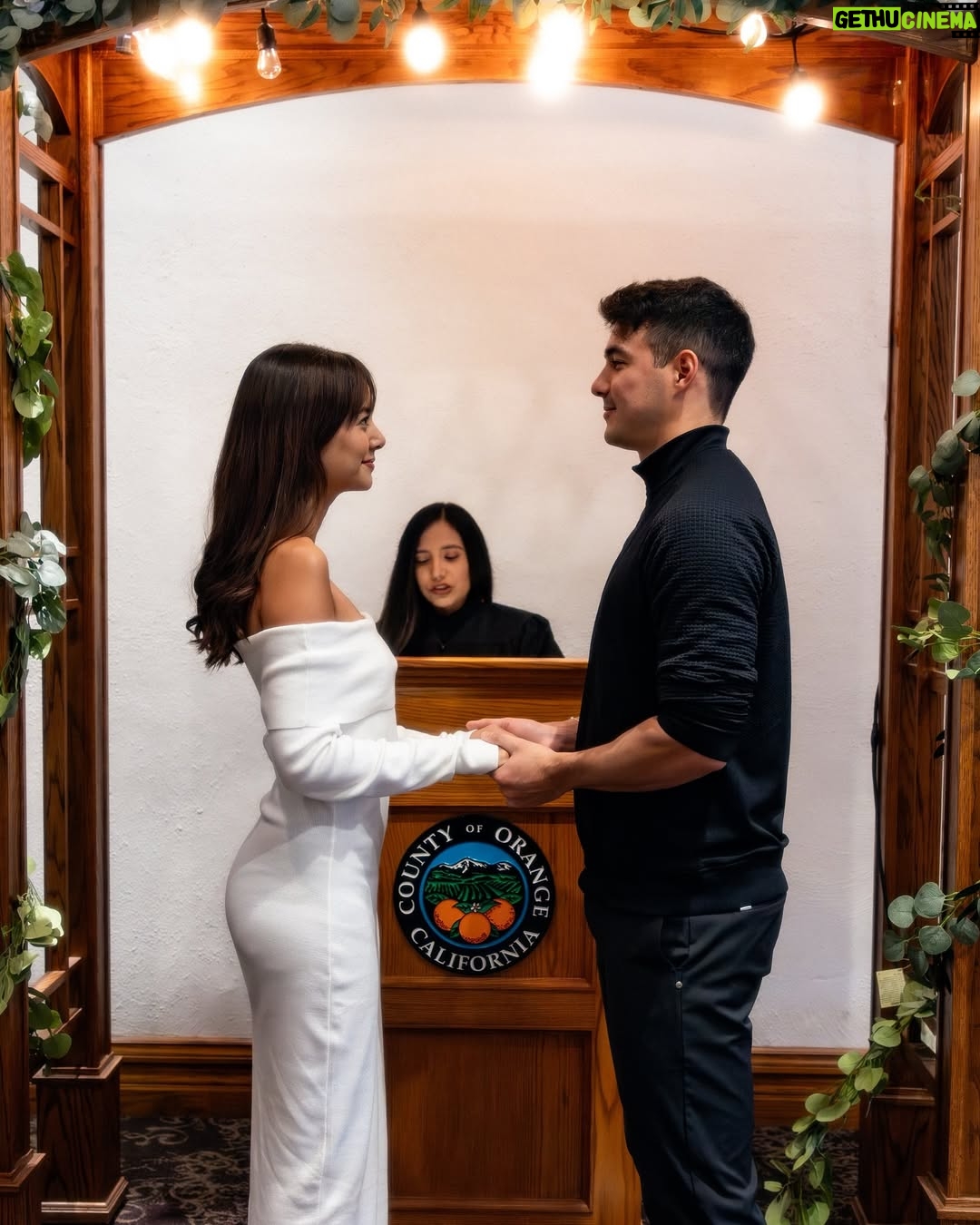 Aurélie Moeremans - 898.7K Likes - On December 30th, we decided to get our marriage license sorted out at the Old Orange County Courthouse so that by the time our big wedding in April rolls around, we can fully enjoy the moment without worrying about paperwork. We thought it was just going to be signing some documents and that’s it—but to our surprise, after signing, the clerk said, ‘Alright, now let’s head to the altar for the ceremony.’ 😅

We weren’t planning for any kind of ceremony and even told her that, but she explained it’s part of the process to make it official. Luckily, I had the random thought to wear a white dress that day—it wasn’t fancy, but at least it felt fitting! Tyler’s mom, dad, and sister were there to support us, which made the moment even more special.

So there we were, doing an impromptu courthouse ceremony. It was simple, unexpected, and unplanned, but also sweet in its own way. Now, we’re officially married, but we’re still looking forward to our big wedding in April with a beautiful ceremony, and a celebration with all our family and friends. Can’t wait to share that moment with you all!

📸 @reagan_dambra
