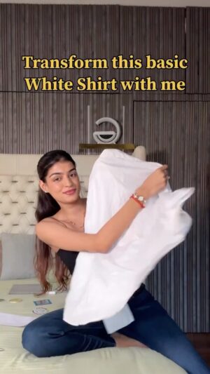 Bhavna Jain Instagram - Saw one heart-cutout top on Pinterest and decided to emotionally damage my only white shirt 💔✂️

Tried to thread a needle for 2 days. Cut fabric like I knew what I was doing. Sewed beads with ✨confidence✨ and zero skill.
Final look? You’ll have to wait for Part 2 🧵👀

#pinterestinspo #heartbreak #handmade #diy #funnyvideos #sassy #upcycling #foryou #doityourselfproject #whiteshirts #diyfashionblogger #maincharacter #fashiondiy #burningheart #transformation #heartshirt