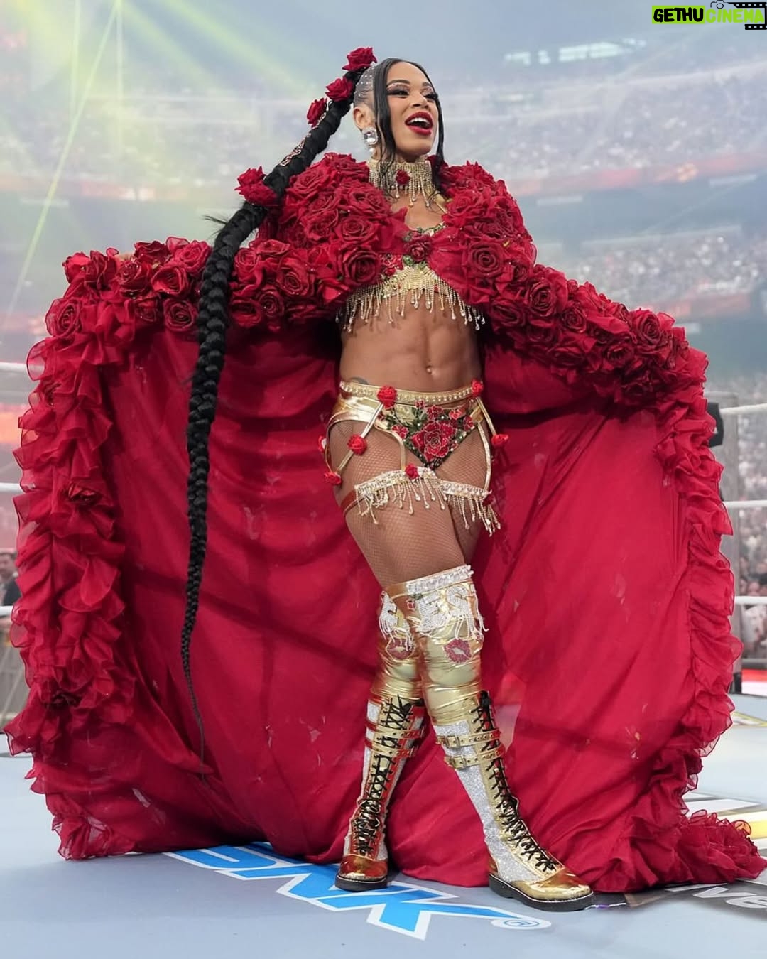 Bianca Crawford - 123.9K Likes - Gear & Entrance Piece: MADE BY ME
greatEST Gear of ALL TIME
🌹🌹🌹🌹🌹🌹
When I was a little girl my Mama asked me what I wanted to be when I grew up and I said “I want people to throw roses at my feet”.she was confused, but we eventually realized I saw someone on tv performing; receiving a round of applause as people threw roses on stage. Basically, I was saying I wanted to perform. I wanted to entertain. I wanted to pour so much of myself into something that it would make people feel so much and have them jumping to their feet! When you work hard and succeed (success is your own definition) you will get your flowers!

I’ve poured so much of myself into what I do. I love what I do. I’m GREAT at what I do, but that doesn’t mean I don’t get tired, frustrated, overwhelmed, burnt out… I work my ASS off INSIDE AND OUTSIDE the ring because I want to be remembered as someone who earned and deserved EVERYTHING they have gotten, I want to be remembered as someone who entertained you and made you feel something, I want to be remembered as an innovator never duplicator, a trendsetter, and history maker, a one of a kind generational talent that makes a difference in an impactful way and changed the game.
Win or lose I love what I do. Win or lose I’m always proud of the body of work WE do. And win or lose I’ll never let up.

My family has always been my biggest supporters and they have always been with me every step of the way. this #wrESTleMania was special because they were even out there with me.  My step daughter was in my entrance jump roping with her braid. I almost broke hugging her and my parents and husband were with me in my entrance. I was so overwhelmed with time and making my gear. My parents flew down on my bday and we all collectively made this entrance piece. It was a full circle moment of telling my Mama I want people to throw roses at my feet as a kid to now being in WWE and having my mama & daddy toss roses to me & @montezfordwwe as we tag teamed to make this piece. 
I’m walking in my purpose and damn it win or lose cheers or boos “it is what it is”. WE did that yesterday and I’ll be damned if I didn’t get my flowers!
#ESTofWWE