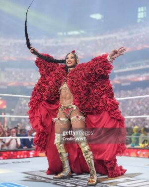 Bianca Crawford Instagram - Gear & Entrance Piece: MADE BY ME
greatEST Gear of ALL TIME
🌹🌹🌹🌹🌹🌹
When I was a little girl my Mama asked me what I wanted to be when I grew up and I said “I want people to throw roses at my feet”.she was confused, but we eventually realized I saw someone on tv performing; receiving a round of applause as people threw roses on stage. Basically, I was saying I wanted to perform. I wanted to entertain. I wanted to pour so much of myself into something that it would make people feel so much and have them jumping to their feet! When you work hard and succeed (success is your own definition) you will get your flowers!

I’ve poured so much of myself into what I do. I love what I do. I’m GREAT at what I do, but that doesn’t mean I don’t get tired, frustrated, overwhelmed, burnt out… I work my ASS off INSIDE AND OUTSIDE the ring because I want to be remembered as someone who earned and deserved EVERYTHING they have gotten, I want to be remembered as someone who entertained you and made you feel something, I want to be remembered as an innovator never duplicator, a trendsetter, and history maker, a one of a kind generational talent that makes a difference in an impactful way and changed the game.
Win or lose I love what I do. Win or lose I’m always proud of the body of work WE do. And win or lose I’ll never let up.

My family has always been my biggest supporters and they have always been with me every step of the way. this #wrESTleMania was special because they were even out there with me.  My step daughter was in my entrance jump roping with her braid. I almost broke hugging her and my parents and husband were with me in my entrance. I was so overwhelmed with time and making my gear. My parents flew down on my bday and we all collectively made this entrance piece. It was a full circle moment of telling my Mama I want people to throw roses at my feet as a kid to now being in WWE and having my mama & daddy toss roses to me & @montezfordwwe as we tag teamed to make this piece. 
I’m walking in my purpose and damn it win or lose cheers or boos “it is what it is”. WE did that yesterday and I’ll be damned if I didn’t get my flowers!
#ESTofWWE