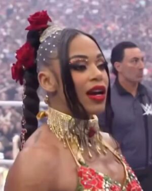 Bianca Crawford Instagram - Gear & Entrance Piece: MADE BY ME
greatEST Gear of ALL TIME
🌹🌹🌹🌹🌹🌹
When I was a little girl my Mama asked me what I wanted to be when I grew up and I said “I want people to throw roses at my feet”.she was confused, but we eventually realized I saw someone on tv performing; receiving a round of applause as people threw roses on stage. Basically, I was saying I wanted to perform. I wanted to entertain. I wanted to pour so much of myself into something that it would make people feel so much and have them jumping to their feet! When you work hard and succeed (success is your own definition) you will get your flowers!

I’ve poured so much of myself into what I do. I love what I do. I’m GREAT at what I do, but that doesn’t mean I don’t get tired, frustrated, overwhelmed, burnt out… I work my ASS off INSIDE AND OUTSIDE the ring because I want to be remembered as someone who earned and deserved EVERYTHING they have gotten, I want to be remembered as someone who entertained you and made you feel something, I want to be remembered as an innovator never duplicator, a trendsetter, and history maker, a one of a kind generational talent that makes a difference in an impactful way and changed the game.
Win or lose I love what I do. Win or lose I’m always proud of the body of work WE do. And win or lose I’ll never let up.

My family has always been my biggest supporters and they have always been with me every step of the way. this #wrESTleMania was special because they were even out there with me.  My step daughter was in my entrance jump roping with her braid. I almost broke hugging her and my parents and husband were with me in my entrance. I was so overwhelmed with time and making my gear. My parents flew down on my bday and we all collectively made this entrance piece. It was a full circle moment of telling my Mama I want people to throw roses at my feet as a kid to now being in WWE and having my mama & daddy toss roses to me & @montezfordwwe as we tag teamed to make this piece. 
I’m walking in my purpose and damn it win or lose cheers or boos “it is what it is”. WE did that yesterday and I’ll be damned if I didn’t get my flowers!
#ESTofWWE