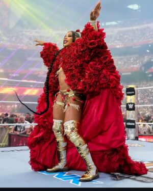 Bianca Crawford Instagram - Gear & Entrance Piece: MADE BY ME
greatEST Gear of ALL TIME
🌹🌹🌹🌹🌹🌹
When I was a little girl my Mama asked me what I wanted to be when I grew up and I said “I want people to throw roses at my feet”.she was confused, but we eventually realized I saw someone on tv performing; receiving a round of applause as people threw roses on stage. Basically, I was saying I wanted to perform. I wanted to entertain. I wanted to pour so much of myself into something that it would make people feel so much and have them jumping to their feet! When you work hard and succeed (success is your own definition) you will get your flowers!

I’ve poured so much of myself into what I do. I love what I do. I’m GREAT at what I do, but that doesn’t mean I don’t get tired, frustrated, overwhelmed, burnt out… I work my ASS off INSIDE AND OUTSIDE the ring because I want to be remembered as someone who earned and deserved EVERYTHING they have gotten, I want to be remembered as someone who entertained you and made you feel something, I want to be remembered as an innovator never duplicator, a trendsetter, and history maker, a one of a kind generational talent that makes a difference in an impactful way and changed the game.
Win or lose I love what I do. Win or lose I’m always proud of the body of work WE do. And win or lose I’ll never let up.

My family has always been my biggest supporters and they have always been with me every step of the way. this #wrESTleMania was special because they were even out there with me.  My step daughter was in my entrance jump roping with her braid. I almost broke hugging her and my parents and husband were with me in my entrance. I was so overwhelmed with time and making my gear. My parents flew down on my bday and we all collectively made this entrance piece. It was a full circle moment of telling my Mama I want people to throw roses at my feet as a kid to now being in WWE and having my mama & daddy toss roses to me & @montezfordwwe as we tag teamed to make this piece. 
I’m walking in my purpose and damn it win or lose cheers or boos “it is what it is”. WE did that yesterday and I’ll be damned if I didn’t get my flowers!
#ESTofWWE