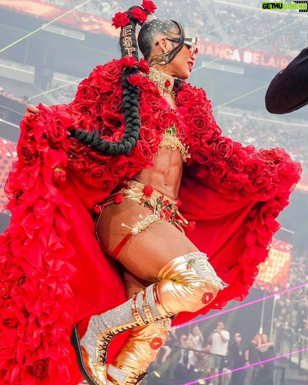 Bianca Crawford - 123.9K Likes - Gear & Entrance Piece: MADE BY ME
greatEST Gear of ALL TIME
🌹🌹🌹🌹🌹🌹
When I was a little girl my Mama asked me what I wanted to be when I grew up and I said “I want people to throw roses at my feet”.she was confused, but we eventually realized I saw someone on tv performing; receiving a round of applause as people threw roses on stage. Basically, I was saying I wanted to perform. I wanted to entertain. I wanted to pour so much of myself into something that it would make people feel so much and have them jumping to their feet! When you work hard and succeed (success is your own definition) you will get your flowers!

I’ve poured so much of myself into what I do. I love what I do. I’m GREAT at what I do, but that doesn’t mean I don’t get tired, frustrated, overwhelmed, burnt out… I work my ASS off INSIDE AND OUTSIDE the ring because I want to be remembered as someone who earned and deserved EVERYTHING they have gotten, I want to be remembered as someone who entertained you and made you feel something, I want to be remembered as an innovator never duplicator, a trendsetter, and history maker, a one of a kind generational talent that makes a difference in an impactful way and changed the game.
Win or lose I love what I do. Win or lose I’m always proud of the body of work WE do. And win or lose I’ll never let up.

My family has always been my biggest supporters and they have always been with me every step of the way. this #wrESTleMania was special because they were even out there with me.  My step daughter was in my entrance jump roping with her braid. I almost broke hugging her and my parents and husband were with me in my entrance. I was so overwhelmed with time and making my gear. My parents flew down on my bday and we all collectively made this entrance piece. It was a full circle moment of telling my Mama I want people to throw roses at my feet as a kid to now being in WWE and having my mama & daddy toss roses to me & @montezfordwwe as we tag teamed to make this piece. 
I’m walking in my purpose and damn it win or lose cheers or boos “it is what it is”. WE did that yesterday and I’ll be damned if I didn’t get my flowers!
#ESTofWWE