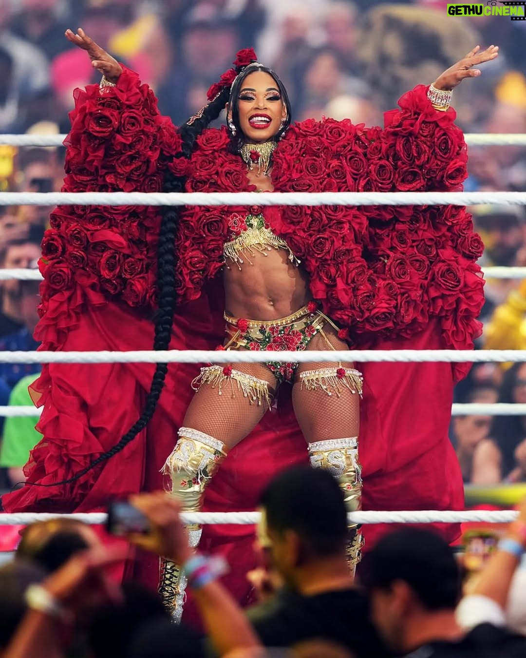 Bianca Crawford - 123.9K Likes - Gear & Entrance Piece: MADE BY ME
greatEST Gear of ALL TIME
🌹🌹🌹🌹🌹🌹
When I was a little girl my Mama asked me what I wanted to be when I grew up and I said “I want people to throw roses at my feet”.she was confused, but we eventually realized I saw someone on tv performing; receiving a round of applause as people threw roses on stage. Basically, I was saying I wanted to perform. I wanted to entertain. I wanted to pour so much of myself into something that it would make people feel so much and have them jumping to their feet! When you work hard and succeed (success is your own definition) you will get your flowers!

I’ve poured so much of myself into what I do. I love what I do. I’m GREAT at what I do, but that doesn’t mean I don’t get tired, frustrated, overwhelmed, burnt out… I work my ASS off INSIDE AND OUTSIDE the ring because I want to be remembered as someone who earned and deserved EVERYTHING they have gotten, I want to be remembered as someone who entertained you and made you feel something, I want to be remembered as an innovator never duplicator, a trendsetter, and history maker, a one of a kind generational talent that makes a difference in an impactful way and changed the game.
Win or lose I love what I do. Win or lose I’m always proud of the body of work WE do. And win or lose I’ll never let up.

My family has always been my biggest supporters and they have always been with me every step of the way. this #wrESTleMania was special because they were even out there with me.  My step daughter was in my entrance jump roping with her braid. I almost broke hugging her and my parents and husband were with me in my entrance. I was so overwhelmed with time and making my gear. My parents flew down on my bday and we all collectively made this entrance piece. It was a full circle moment of telling my Mama I want people to throw roses at my feet as a kid to now being in WWE and having my mama & daddy toss roses to me & @montezfordwwe as we tag teamed to make this piece. 
I’m walking in my purpose and damn it win or lose cheers or boos “it is what it is”. WE did that yesterday and I’ll be damned if I didn’t get my flowers!
#ESTofWWE