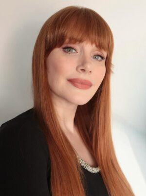 Bryce Dallas Howard Instagram - @nikki_makeup, you can do no wrong ✨⁣
⁣
Makeup & Photo by @nikki_makeup⁣
⁣
[ID: In the makeup trailer for a behind-the-scenes interview, BDH poses for portraits wearing a black shirt with silver beading around the collar. Her makeup is dewy and clean and her hair is down and incredibly long — it’s day 123 of not cutting it (aside from her bangs) and she’s loving it.]