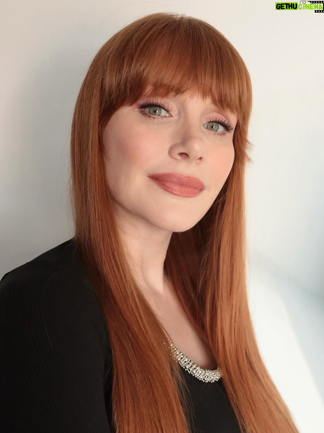 Bryce Dallas Howard - 344.8K Likes - @nikki_makeup, you can do no wrong ✨⁣
⁣
Makeup & Photo by @nikki_makeup⁣
⁣
[ID: In the makeup trailer for a behind-the-scenes interview, BDH poses for portraits wearing a black shirt with silver beading around the collar. Her makeup is dewy and clean and her hair is down and incredibly long — it’s day 123 of not cutting it (aside from her bangs) and she’s loving it.]