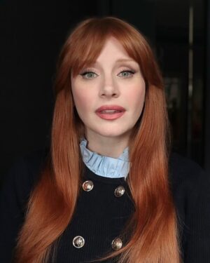 Bryce Dallas Howard Instagram - Thank you #SXSWLondon for hosting the world premiere of Deep Cover — right in Shoreditch, in the very neighborhood where we filmed, surrounded by the team who brought it to life.

This film is a love letter to improv, to London, and to every cast and crew member who poured their talent and heart into it. 

#DeepCover streams June 12 on @primevideo.

Hair: @halleybrisker
Makeup: @nikki_makeup
Nails: @veenailz

📸 1-2, 7-8: @nikki_makeup
📸 3-5: Getty Images for SXSW London
📸 6: Anthony Harvey/Shutterstock for Amazon Prime Video

[ID: BDH poses for portraits wearing a navy blue @sandroparis sweater with rows of silver buttons on the front on a light blue ruffle collar.  

At the @sxswlondon premiere of Deep Cover, she stands alongside the cast and crew in a black @sandroparis striped three-piece suit with sequins and @stuartweitzman heels. Her hair is straight and falls behind her shoulders. 

And before the premiere, the trio (BDH, Orlando, and Nick) surprise an improv class at the legendary @comedystorelondon and take a photo on the iconic blue-curtained stage. BDH wears a grey @majeparis sweater with a lace collar, @mother jeans, and her silver @rebeccaminkoff pumps.]