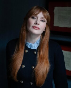 Bryce Dallas Howard Instagram - Thank you #SXSWLondon for hosting the world premiere of Deep Cover — right in Shoreditch, in the very neighborhood where we filmed, surrounded by the team who brought it to life.

This film is a love letter to improv, to London, and to every cast and crew member who poured their talent and heart into it. 

#DeepCover streams June 12 on @primevideo.

Hair: @halleybrisker
Makeup: @nikki_makeup
Nails: @veenailz

📸 1-2, 7-8: @nikki_makeup
📸 3-5: Getty Images for SXSW London
📸 6: Anthony Harvey/Shutterstock for Amazon Prime Video

[ID: BDH poses for portraits wearing a navy blue @sandroparis sweater with rows of silver buttons on the front on a light blue ruffle collar.  

At the @sxswlondon premiere of Deep Cover, she stands alongside the cast and crew in a black @sandroparis striped three-piece suit with sequins and @stuartweitzman heels. Her hair is straight and falls behind her shoulders. 

And before the premiere, the trio (BDH, Orlando, and Nick) surprise an improv class at the legendary @comedystorelondon and take a photo on the iconic blue-curtained stage. BDH wears a grey @majeparis sweater with a lace collar, @mother jeans, and her silver @rebeccaminkoff pumps.]