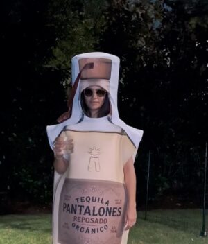 Camila Alves Instagram - may whats in the bottle always be your favorite! Happy Halloween.