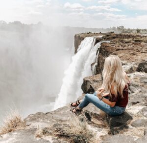 Cassidy Wolf Instagram - Reminiscing to the one time I flew over & sat on the edge of Victoria Falls in Zambia... Bucket List ✔️