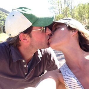 Christy Turlington Instagram - 🥂 to 22 years married. 2 kids in college. 2 fur babies. 2 many memories to name but a few sweet kisses to remind us where we started and how far we’ve come together. 💞