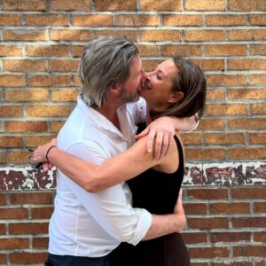 Christy Turlington Instagram - 🥂 to 22 years married. 2 kids in college. 2 fur babies. 2 many memories to name but a few sweet kisses to remind us where we started and how far we’ve come together. 💞