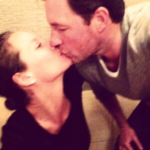 Christy Turlington Instagram - 🥂 to 22 years married. 2 kids in college. 2 fur babies. 2 many memories to name but a few sweet kisses to remind us where we started and how far we’ve come together. 💞