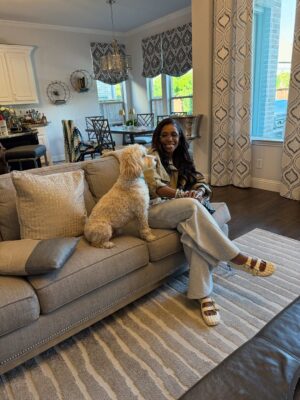 Dr. Jackie Walters Instagram - Recently I traveled to Dallas, Texas to celebrate one of my baby @charlieee.danielle senior night and this is what happened…. Everyone who knows me knows I am not a dog person. In fact, let’s be real… I’ve been downright afraid of dogs since childhood. But this weekend, my friend’s sweet Georgia had a mission — and that mission was me.

She followed me from room to room, leaned on me, stared straight into my soul like she was saying, “Ma’am, I will be your friend.” I tried to resist. I failed.

By the end of the day, I was still a little nervous… but also a little amazed. Maybe 3% less afraid, 10% more impressed, and 100% convinced that dogs have intuition.

Sometimes love shows up in fur, paws, and pure persistence.
