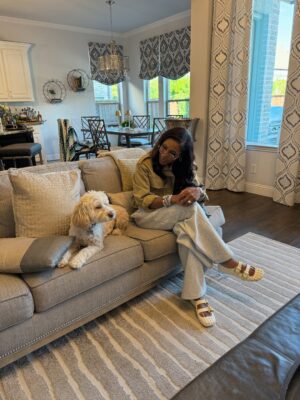 Dr. Jackie Walters Instagram - Recently I traveled to Dallas, Texas to celebrate one of my baby @charlieee.danielle senior night and this is what happened…. Everyone who knows me knows I am not a dog person. In fact, let’s be real… I’ve been downright afraid of dogs since childhood. But this weekend, my friend’s sweet Georgia had a mission — and that mission was me.

She followed me from room to room, leaned on me, stared straight into my soul like she was saying, “Ma’am, I will be your friend.” I tried to resist. I failed.

By the end of the day, I was still a little nervous… but also a little amazed. Maybe 3% less afraid, 10% more impressed, and 100% convinced that dogs have intuition.

Sometimes love shows up in fur, paws, and pure persistence.