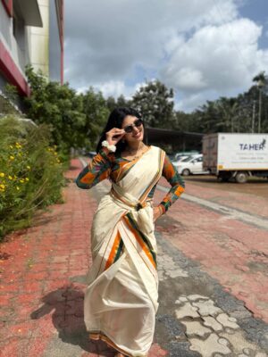 Drishya Raghunath Instagram - Happy onam from DOSE 🫶🏻

Wearing : @abhiramam_ 🌻

#drishya #drishyaraghunath