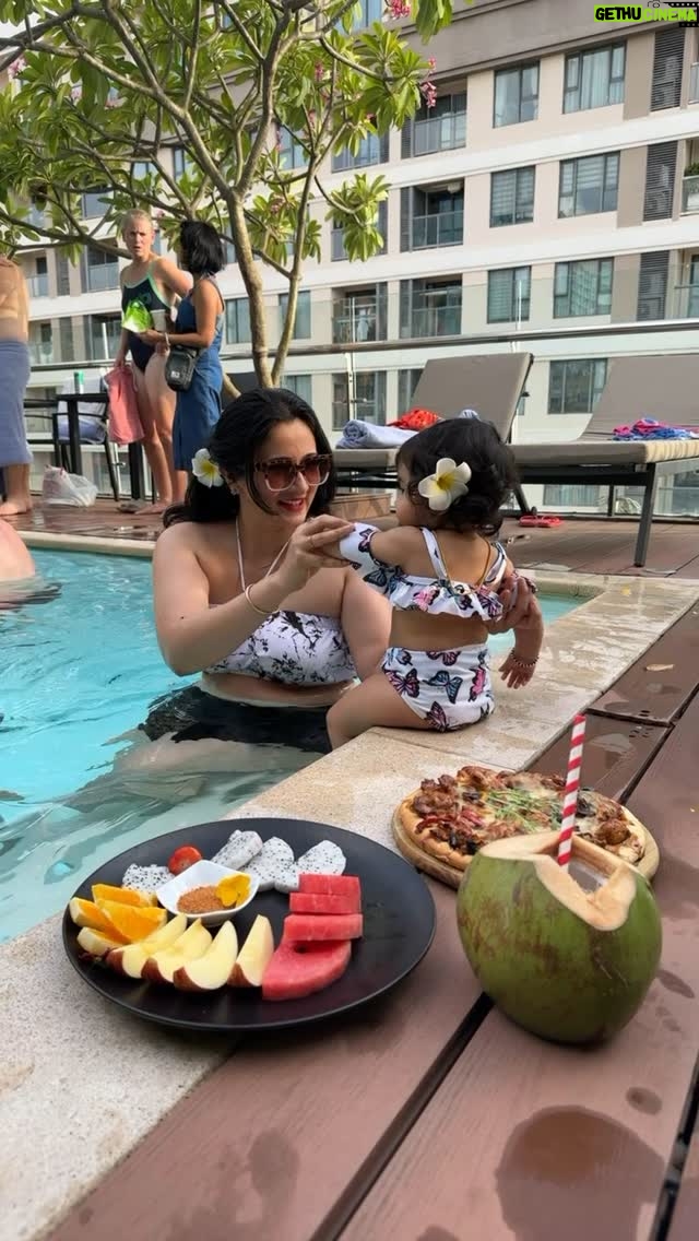 Harshika Poonacha - 81.2K Likes - Princess Tridevi Ponnakkaah is Officially a Water Baby 🥰 
My baby’s first pool experience ♥️♥️♥️
She loves water just like her parents♥️
VC @bhuvann_ponnannaa_official 
#princess #trideviponnakkaah #harshikapoonacha #bhuvanponnanna #newmom #love #fathersday #parents #vacation #vietnam #hochiminh 
.
.
.
.
.
.
.
.
.
Thankyou @paragonsaigon.hotel for having such a lovely pool and super glad we connected with @trawel_mart for booking us the stay for this vacation.
Totally worth it ♥️
PS : The food was amazing , The #chickenpizza you see on the video was out of the world 💕