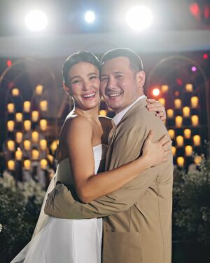 Isabel Oli Instagram - Big thanks to @niceprintphoto for making sure we’ll never forget how much fun this vow renewal was! 📸🎥 Love, laughter, and a whole lot of ‘I do’ all over again. Hello to forever (and lots of great photos to prove it)!!!💍 

#LIVinTheMomentWithJohn 

📍 @nayomiresort 
Tent, Sounds & lights: @ignite.pro 
Food Catering: @juancarlocaterer
📷 @niceprintphoto @charissetinionp 
Event Stylist: @teddymanuel 
Wedding coordinator: @cotevents 
E-invite : @printdivas
Logo: @alwaysinmotionlive

Ceremony Gown: @rosaclaraph 
Party dress: @joesanantonio 
Makeup: @deniseochoa
Hair : @kielotilla 
Rings: @jsdiamondjewellery

John and Freedom’s suit: @the_finegentleman 
Lilly and Lilla’s dress: @audwinlee
Shoes: @jeffersonsi_designs

Smoothie cart: NYMi by @nayomiresort
Fish ball cart: @aysaucefoodcart
Sandwich: @the.croissanterie
Hotdog bun cart: @hotlinksph
Ice cream: @danielbakerph
Coffee cart: @pilgrimscoffee.ph
Charm cart: @the_travelling_charm_bar
Dessert bar: @heavenlydesserts_bychefjeng
Drinks 🍹 : @manilacraft 

Stickers: @WristbandsManiaPH 
Fans: @jisulife.ph
Umbrella: @giftcentral.ph
Tote bags: @heartandsoulphilippines
Candles: @lumicandles.ph
Perfume: @lillaly.ph