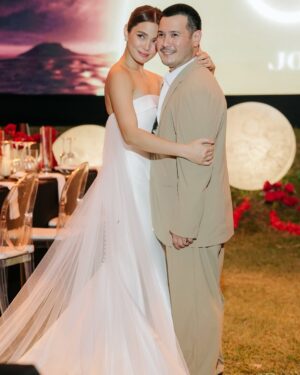 Isabel Oli Instagram - Big thanks to @niceprintphoto for making sure we’ll never forget how much fun this vow renewal was! 📸🎥 Love, laughter, and a whole lot of ‘I do’ all over again. Hello to forever (and lots of great photos to prove it)!!!💍 

#LIVinTheMomentWithJohn 

📍 @nayomiresort 
Tent, Sounds & lights: @ignite.pro 
Food Catering: @juancarlocaterer
📷 @niceprintphoto @charissetinionp 
Event Stylist: @teddymanuel 
Wedding coordinator: @cotevents 
E-invite : @printdivas
Logo: @alwaysinmotionlive

Ceremony Gown: @rosaclaraph 
Party dress: @joesanantonio 
Makeup: @deniseochoa
Hair : @kielotilla 
Rings: @jsdiamondjewellery

John and Freedom’s suit: @the_finegentleman 
Lilly and Lilla’s dress: @audwinlee
Shoes: @jeffersonsi_designs

Smoothie cart: NYMi by @nayomiresort
Fish ball cart: @aysaucefoodcart
Sandwich: @the.croissanterie
Hotdog bun cart: @hotlinksph
Ice cream: @danielbakerph
Coffee cart: @pilgrimscoffee.ph
Charm cart: @the_travelling_charm_bar
Dessert bar: @heavenlydesserts_bychefjeng
Drinks 🍹 : @manilacraft 

Stickers: @WristbandsManiaPH 
Fans: @jisulife.ph
Umbrella: @giftcentral.ph
Tote bags: @heartandsoulphilippines
Candles: @lumicandles.ph
Perfume: @lillaly.ph