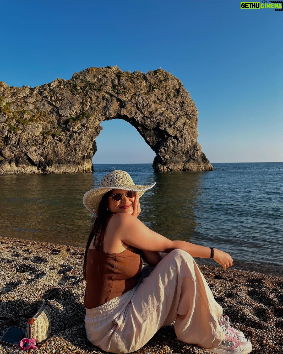 Ishita - 11.9K Likes - The only “door” I don’t mind being locked out of—forever ☀️🌊🐚

[durdle door , london , fashion , beach outfits , beach girlie , beach fits , pinterest inspired,fashion girlie ]