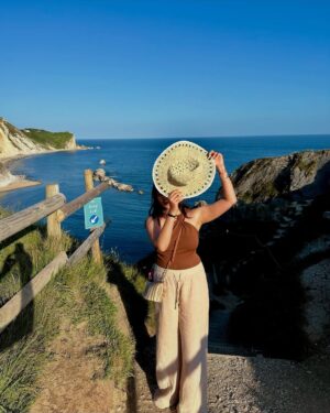 Ishita Instagram - The only “door” I don’t mind being locked out of—forever ☀️🌊🐚

[durdle door , london , fashion , beach outfits , beach girlie , beach fits , pinterest inspired,fashion girlie ]