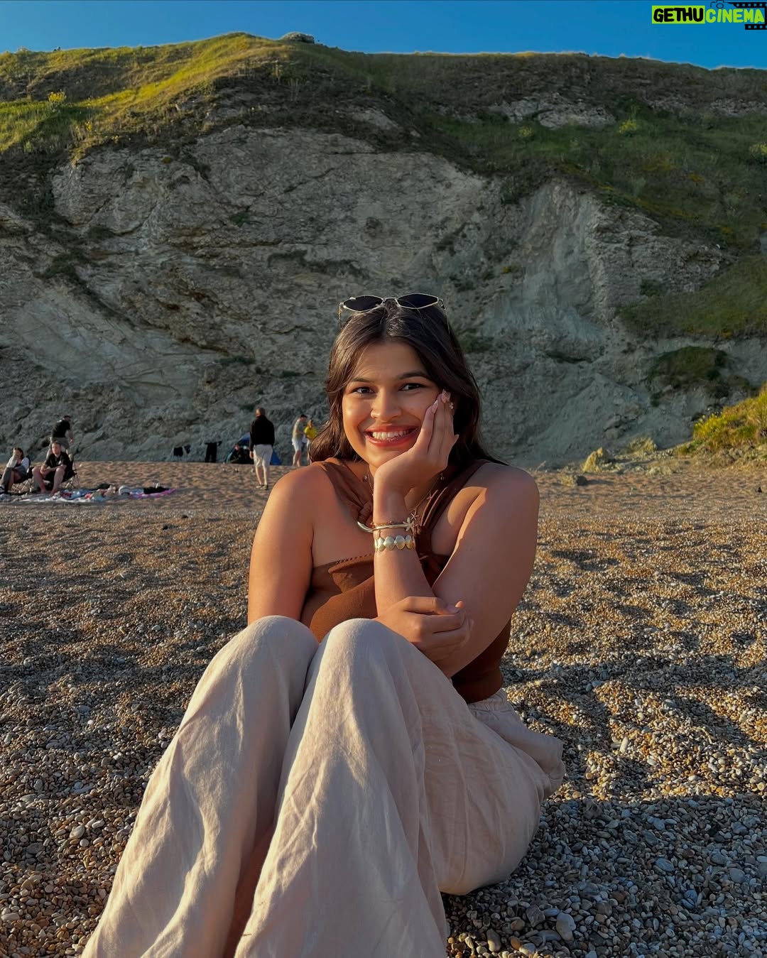 Ishita - 11.9K Likes - The only “door” I don’t mind being locked out of—forever ☀️🌊🐚

[durdle door , london , fashion , beach outfits , beach girlie , beach fits , pinterest inspired,fashion girlie ]