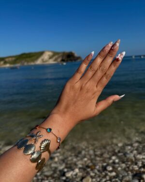 Ishita Instagram - The only “door” I don’t mind being locked out of—forever ☀️🌊🐚

[durdle door , london , fashion , beach outfits , beach girlie , beach fits , pinterest inspired,fashion girlie ]