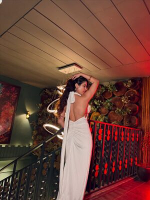 Ishita Anand Instagram - Everyone: Black is color for the night😎
ME: Walks in glowing in WHITE😉

Convince me I’m wrong in the comments. I dare you 😜

[white dress, night out look, evening outfit, party wear dress, satin dress, glam night look, girls night outfit, elegant dress, cocktail night fit, trending fashion 2025, Indian fashion creator, night party glam, backless dress, V neck, Delhi blogger, Ishita Anand ]
