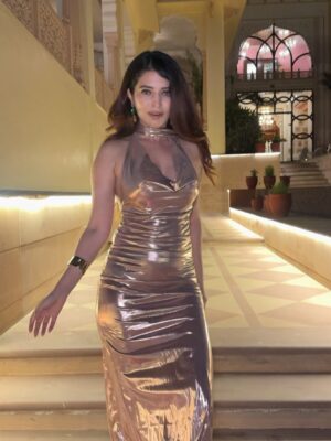 Ishita Anand Instagram - Rose-gold nights & royal backdrops ‼️
Took our girls’ date night to a whole new mahal energy🥵
Dressed for drama, dined under the stars 🌟 

Dress by @kaysha.in ❤️‍🔥

[rose gold gown, satin evening dress, Jaipur luxury stay, Rajasthani palace outfit, girls dinner outfit, destination fashion, night glam look, Indian resort style, bodycon date night dress, Ishita Anand, metallic dress, backless ]