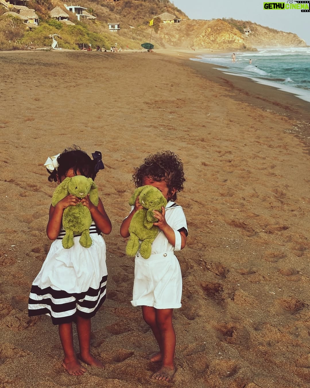 Jackie Cruz - 22.2K Likes - Raising kids on the coast of Oaxaca is like living in paradise… if paradise included tantrums, sand in your underwear, and someone yelling Mamáaaaa!every five minutes.

We’re messy, chaotic, we are rarely on time, always losing our car keys, and yet, somehow, always finding joy.

Between the ocean breeze, the barefoot mornings, and being constantly full of sand, I wouldn’t trade this life for anything.

This Easter, I’m grateful for our loud, sandy, beautiful little tribe and the fact that I got one decent family photo before someone cried.

Feliz Pascua, from our wild beach crew to yours!