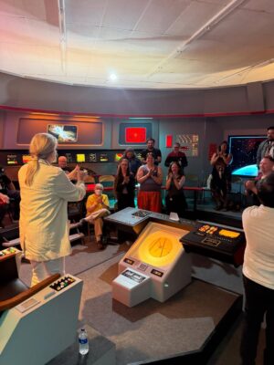Kate Mulgrew Instagram - Always at home in the big chair, no matter which ship 💫
Thank you to @star_trek_set_tour for a memorable experience and to all the fans who came out to celebrate Star Trek's legacy with me this past weekend. You always prove yourselves to be the best fans in the galaxy!🖖🏻
Photos: @joey_flaherty 📸