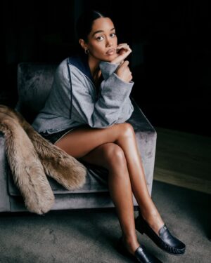Laura Harrier Instagram - After making her runway debut in last season’s @MiuMiu show, #LauraHarrier was a guest for the SS26 presentation – her first time witnessing Miuccia Prada’s designs from the front row. At the link in bio, the It-girl shares her Parisian diary with #BritishVogue. 

Photographed by @OliverHolms.