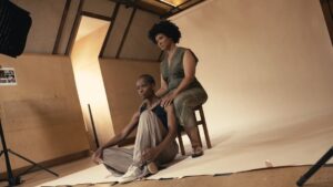 Letitia Wright Instagram - Go behind the scenes with Letitia Wright and Golda Rosheuvel on the Not Your Superwoman artwork shoot 🎥

This was the first time the full team got together, marking the start of the journey of this hilarious and heart-wrenching production 🧡

Running 6 Sep - 1 Nov.

Video by @dmlkvideo 

Artwork photography by @courtneynp
Art direction by @edtheakston93
Make-up by @makeupbyemmam
Gaffer @toyin.jpeg
Retoucher @harveyaraja
