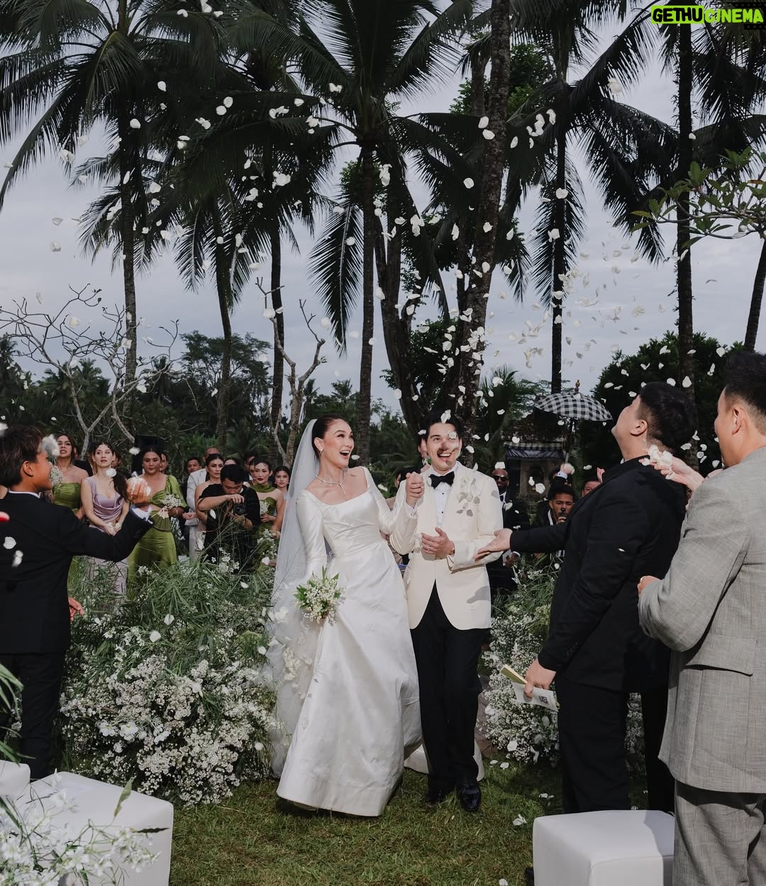 Luna Maya - 795.9K Likes - In the garden of promises, we bloomed as one #ceremony #TheReception 🌸

📸: @derai.studio 

Wedding Planner @paper_diamonds
Show Management @innazcommunique
Wedding venue @comoshambhalaestate
Decorator @tearosewedding
Sound & Lighting @focusproind
-
Principal Photographer & Videographer @derai.studio
Photographer & Videogarpher @iluminen
Photographer @bramsky.bramsky
Content Creation @by_avera @mv.behindthewed
- 
Wedding cake @butter_bali
Stationery Designer & Illustrator @kurniawanhowijaya 
Invitation printing @new.fanda.print
RSVP Management @undangin_com
-
Styled by: @astecat @bimopermadi
Asst Stylist: @lionardychoky 
Ceremony Dress @yeftagunawan
Dinner dress @yeftagunawan
After party dress @jeffrytan
Luna’s Jewellry @bvlgari 
Luna’s make-up @archangelachelsea
Luna’s hair @kieferlippens
Luna’s shoes @rococostore @christianlouboutin @jimmychoo
Maxime shoes @christianlouboutin
Maxime make up @ryanogilvy @rhaydavid
Maxime hair do @ranggayusuf
Maxime Jewelry @franknco_id
Groomsmen attire @wonghangtailor
Groomsmen Suit @samuelwongso

Groomsmen hair do @krisna_endi 
Bridesmaids makeup @cokistrimirah @andychunmakeup @victoria_makeupatelier 
Bridesmaid fabric by @the.designerworkshop 
Bridesmaid hair do @krisna_endi @ine_hairdo_bali 

Skincare prep set @hannaglow.official
Mineral water brides & grooms @jiwaterartesian
- 
Entertainment 
@luxevoirid
 @orangeproductionasia
@phoneafriend.co
@rollportraits
@akustikaentertainment.id

#MOONtotheMAX #LUNAdicintaiMAXIMal