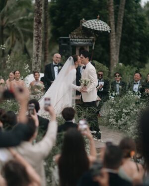Luna Maya Instagram - In the garden of promises, we bloomed as one #ceremony #TheReception 🌸
📸: @derai.studio
Wedding Planner @paper_diamonds
Show Management @innazcommunique
Wedding venue @comoshambhalaestate
Decorator @tearosewedding
Sound & Lighting @focusproind
-
Principal Photographer & Videographer @derai.studio
Photographer & Videogarpher @iluminen
Photographer @bramsky.bramsky
Content Creation @by_avera @mv.behindthewed
-
Wedding cake @butter_bali
Stationery Designer & Illustrator @kurniawanhowijaya
Invitation printing @new.fanda.print
RSVP Management @undangin_com
-
Styled by: @astecat @bimopermadi
Asst Stylist: @lionardychoky
Ceremony Dress @yeftagunawan
Dinner dress @yeftagunawan
After party dress @jeffrytan
Luna’s Jewellry @bvlgari
Luna’s make-up @archangelachelsea
Luna’s hair @kieferlippens
Luna’s shoes @rococostore @christianlouboutin @jimmychoo
Maxime shoes @christianlouboutin
Maxime make up @ryanogilvy @rhaydavid
Maxime hair do @ranggayusuf
Maxime Jewelry @franknco_id
Groomsmen attire @wonghangtailor
Groomsmen Suit @samuelwongso
Groomsmen hair do @krisna_endi
Bridesmaids makeup @cokistrimirah @andychunmakeup @victoria_makeupatelier
Bridesmaid fabric by @the.designerworkshop
Bridesmaid hair do @krisna_endi @ine_hairdo_bali
Skincare prep set @hannaglow.official
Mineral water brides & grooms @jiwaterartesian
-
Entertainment
@luxevoirid
@orangeproductionasia
@phoneafriend.co
@rollportraits
@akustikaentertainment.id
#MOONtotheMAX #LUNAdicintaiMAXIMal