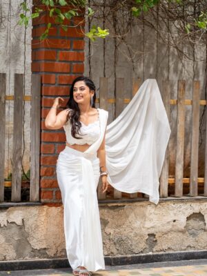 Madhumitha H Instagram - In my white era 🤍🦢🪞

MUA - @vibah_artistry 
Hairstylist- @hairbyswarna 
Outfit - @papilioforyou 
Shot by - @shoutout_campus 

#white #awards #jfw #whitedress