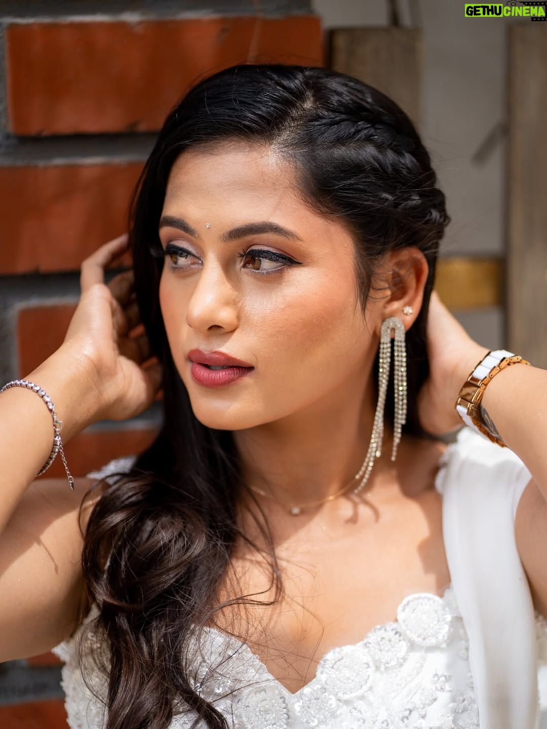 Madhumitha H - 47.2K Likes - In my white era 🤍🦢🪞

MUA - @vibah_artistry 
Hairstylist- @hairbyswarna 
Outfit - @papilioforyou 
Shot by - @shoutout_campus 

#white #awards #jfw #whitedress