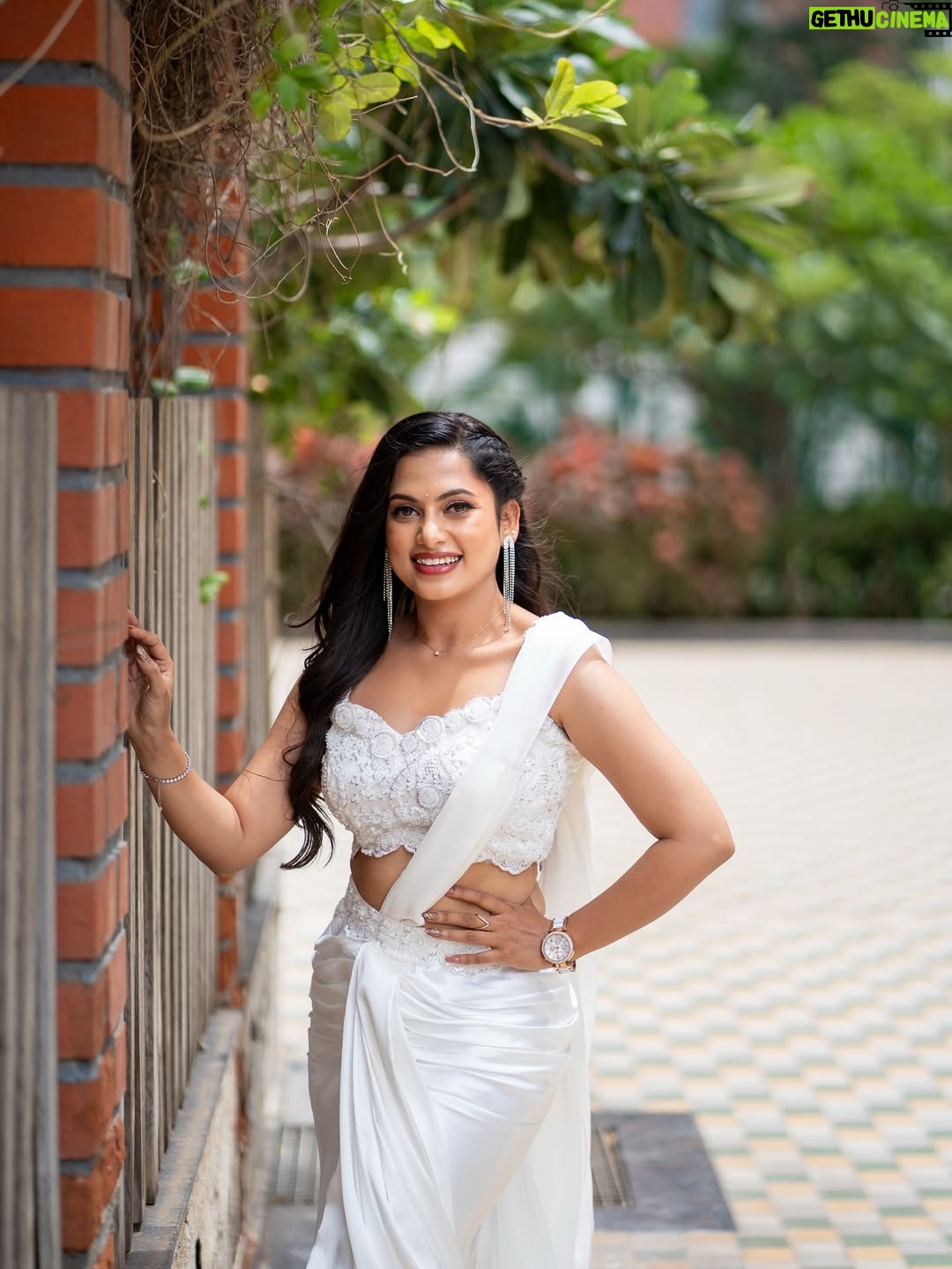 Madhumitha H - 47.2K Likes - In my white era 🤍🦢🪞

MUA - @vibah_artistry 
Hairstylist- @hairbyswarna 
Outfit - @papilioforyou 
Shot by - @shoutout_campus 

#white #awards #jfw #whitedress
