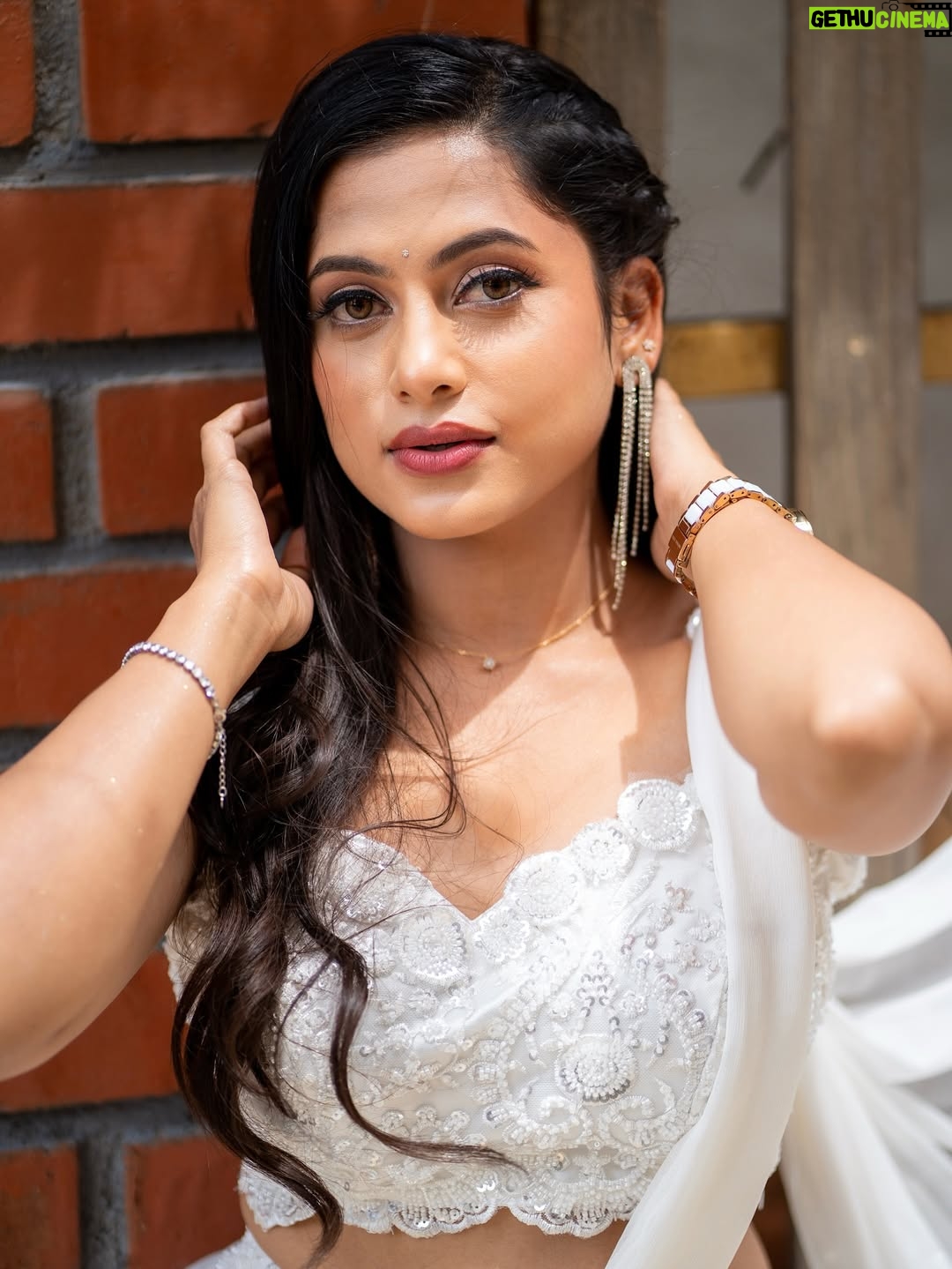 Madhumitha H - 47.2K Likes - In my white era 🤍🦢🪞

MUA - @vibah_artistry 
Hairstylist- @hairbyswarna 
Outfit - @papilioforyou 
Shot by - @shoutout_campus 

#white #awards #jfw #whitedress