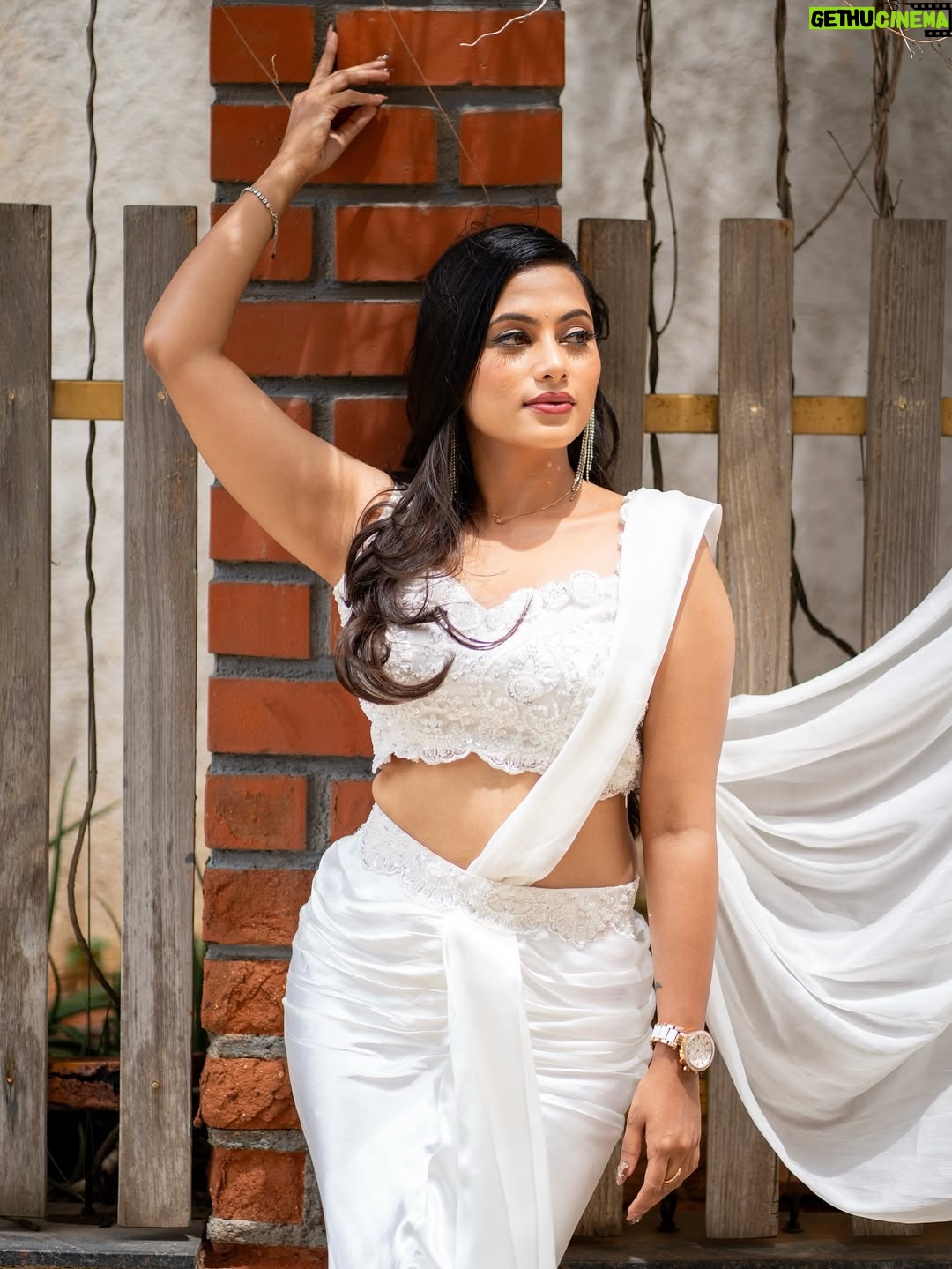Madhumitha H - 47.2K Likes - In my white era 🤍🦢🪞

MUA - @vibah_artistry 
Hairstylist- @hairbyswarna 
Outfit - @papilioforyou 
Shot by - @shoutout_campus 

#white #awards #jfw #whitedress