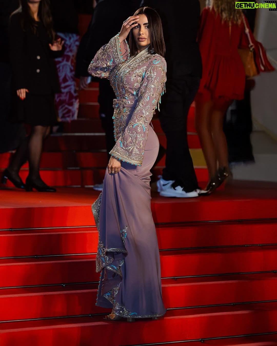 Marine El Himer - 63.7K Likes - Walking the red carpet this year was a true honor.
A powerful moment filled with emotion, something I’m proud to have experienced.

I chose to wear a caftan, an elegant symbol of tradition, to pay tribute to my Moroccan roots.
Proud to celebrate where I come from and let it shine on the red carpet with grace and authenticity.

Thank you to everyone who made this unforgettable moment possible.

Caftan by @darcaftan__ 
📷 @gorbun_roman 

Collaboration commerciale.