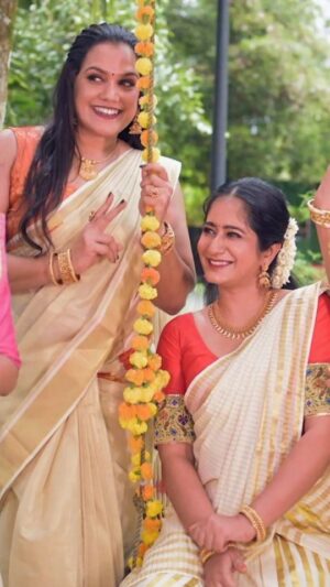 Megha Mathew Instagram - This Onam may love and togetherness sparkle brighter than ever.â¨
Brand : Parakkat Jewels @parakkat_jewels
Artist : @preethiofficial_ @megha_mathew_ @__rajeena_c_rajan__ @rinianngeorge
Direction:@nanduu_lal
Costume & Styling: @ross_anns.
MUA: @sitharasmakeoverstudio
Agency: @blumansa_magic
#onam #keralagram #parakkatjewels #blumansa #srk
