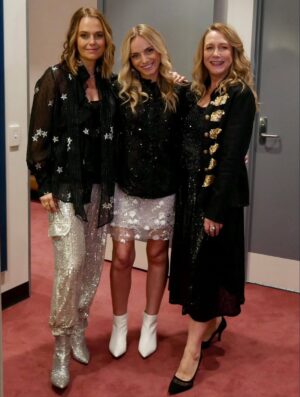 Mia Freedman Instagram - For the last two years, @joeythelabel has dressed us for the @mamamiaoutloud live shows. 
This has meant that @wainwrightholly @jessiestephens90 and I have not had to think about our clothes for a second because we always feel so special and comfortable in our Joey outfits. They just look so good. And she designs for real women’s bodies. 
@joeythelabel is a small, independent Australian business founded by Jo Trotter who is doing it tough after the sudden loss of her sister and has had to take some time from her business. 
As any business owner knows, this is perilous because you don’t get any kind of leave or holidays - the buck stops wtrh you.
So to keep her beloved business afloat Jo is having a big sale. So if you’ve ever thought about buying something from her, now is the time.
I’ve been collecting @joeythelabel pieces for years - and I am proud to own many of her iconic designs. She brings such sparkle and joy to her clothes, I feel so fantastic  every time I put on something Jo has designed. She somehow manages to make classic pieces that are also just so fun and unlike what everyone else does. 
If you can, please support her - and all small businesses founded and run by women - whenever you can. It makes all the difference in the world…. ❤️❤️❤️❤️