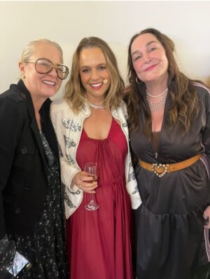 Mia Freedman Instagram - For the last two years, @joeythelabel has dressed us for the @mamamiaoutloud live shows. 
This has meant that @wainwrightholly @jessiestephens90 and I have not had to think about our clothes for a second because we always feel so special and comfortable in our Joey outfits. They just look so good. And she designs for real women’s bodies. 
@joeythelabel is a small, independent Australian business founded by Jo Trotter who is doing it tough after the sudden loss of her sister and has had to take some time from her business. 
As any business owner knows, this is perilous because you don’t get any kind of leave or holidays - the buck stops wtrh you.
So to keep her beloved business afloat Jo is having a big sale. So if you’ve ever thought about buying something from her, now is the time.
I’ve been collecting @joeythelabel pieces for years - and I am proud to own many of her iconic designs. She brings such sparkle and joy to her clothes, I feel so fantastic  every time I put on something Jo has designed. She somehow manages to make classic pieces that are also just so fun and unlike what everyone else does. 
If you can, please support her - and all small businesses founded and run by women - whenever you can. It makes all the difference in the world…. ❤️❤️❤️❤️
