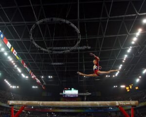 Nastia Liukin Instagram - From the first handstand ever held, to the one on the edge of a NYC skyscraper 🙃 From injuries that demanded patience to comebacks that taught resilience.
The little girl who dared to believe that a dream - no matter how impossible so many tried to make her believe - was worth chasing. The one who cartwheeled in hallways and pretended every single curb was a balance beam, Happy National Gymnastics Day 🤍
Often people see gymnastics as the pursuit of perfection - because who didn’t daydream about becoming the next Nadia Comaneci? But the longer I’ve been away from competing, the more I’ve realized - for me, it was never really about perfection. It was about learning how to fall (literally and figuratively) and, more importantly, how to rise with more courage each time. It what shapes you into someone stronger than you could’ve imagined - ultimately, not the “perfect” you, but the best you.
So today, on National Gymnastics Day, I’m sending love to every gymnast whose dreams are at times held together by tape, chalk and a little extra stubbornness. To every coach who believes in someone before she learns to believe in herself. To every parent enduring seven-hour meets, surviving on concession-stand pretzels.
And especially to the little girl in the last photo - tiny, determined, already all-in.
She had no idea what she was signing up for. But she never looked back. To the sport that raised me, tested me, and gave me everything: I’ll always owe you more than words.
xx NL