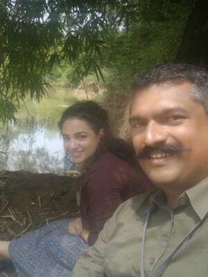 Nithya Menen Instagram - There are some moments (that come rarely) when I feel very nourished by a movie. Simply because it was real cinema… and I could engage the artist in me. I could really do the work that I was always meant to do , but get to do so little of :)
One of those movies is ‘Kolaambi’ directed by @tkrajeevkumar . And it is, to date, one of the few films I’ve done that I know will stand the test of time. Because art lives on and never gets old, and never changes. I still remember well, the day Rajeev sir came to see me in Bangalore at my home to talk to me about this film. It sounded like a real film. Like it had a beating heart. I didn’t need even a moment to think about it. 
And as I expected, I loved working on the film and the people there - The ‘Agrahaaram’ we shot in - where the people would greet us every morning as they went about their everyday routine. We were now just a part of their routine and they would treat us so casually- which I LOVED! No unnecessary intrusion, attention, excitement regarding films or actors or  shooting. What a dream that was- to go about our work normally. We made sure we were as respectful as possible too- keeping silence, eating vegetarian food and keeping the place clean . 
The spunky ‘Paati’ who kept me company while I was waiting in-between shots. She shared her home, her stories and most of all- her AC with us :D
After a week, I found our Line Producer Sujit Soman sitting on her dining table at the far end of her house, eating his meals. They let us do that. They shared everything. 
The river at the end of the road to the Agrahaaram that I would walk up to whenever I had some time . It was a dream to be so close to nature which, truth be told, is the thing I enjoy most. 
And our communal meals in that same restaurant in Fort Cochin! @iamsijoyvarghese @siddharth2121 @r_varman_ and I . We would put all the food in the middle and eat straight off the same bowl. I miss that very much. I felt like myself & I took away something big from it, thanks to Sijoy :)
I hope I have more of this in the days and years to come - these kind of films and these kind of people 🌺
@renji_panicker @rohinimolleti @dileeshpothan @resulpookutty @sabu_cyril
