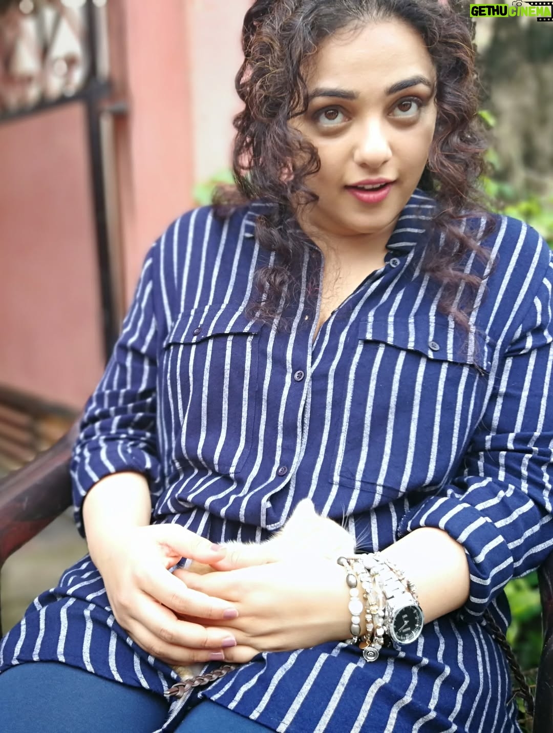Nithya Menen - 1.4 Million Likes - There are some moments (that come rarely) when I feel very nourished by a movie. Simply because it was real cinema… and I could engage the artist in me. I could really do the work that I was always meant to do , but get to do so little of :)
One of those movies is ‘Kolaambi’ directed by @tkrajeevkumar . And it is, to date, one of the few films I’ve done that I know will stand the test of time. Because art lives on and never gets old, and never changes. I still remember well, the day Rajeev sir came to see me in Bangalore at my home to talk to me about this film. It sounded like a real film. Like it had a beating heart. I didn’t need even a moment to think about it. 
And as I expected, I loved working on the film and the people there - The ‘Agrahaaram’ we shot in - where the people would greet us every morning as they went about their everyday routine. We were now just a part of their routine and they would treat us so casually- which I LOVED! No unnecessary intrusion, attention, excitement regarding films or actors or  shooting. What a dream that was- to go about our work normally. We made sure we were as respectful as possible too- keeping silence, eating vegetarian food and keeping the place clean . 
The spunky ‘Paati’ who kept me company while I was waiting in-between shots. She shared her home, her stories and most of all- her AC with us :D
After a week, I found our Line Producer Sujit Soman sitting on her dining table at the far end of her house, eating his meals. They let us do that. They shared everything. 
The river at the end of the road to the Agrahaaram that I would walk up to whenever I had some time . It was a dream to be so close to nature which, truth be told, is the thing I enjoy most. 
And our communal meals in that same restaurant in Fort Cochin! @iamsijoyvarghese @siddharth2121 @r_varman_ and I . We would put all the food in the middle and eat straight off the same bowl. I miss that very much. I felt like myself & I took away something big from it, thanks to Sijoy :)
I hope I have more of this in the days and years to come - these kind of films and these kind of people 🌺
@renji_panicker @rohinimolleti @dileeshpothan @resulpookutty @sabu_cyril
