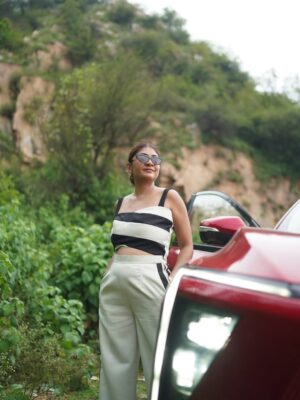 Nupur Kalra Instagram - 🌸❤️
When Your outfit and your ride both turn heads.💫
.
.
.
@nups_thebikermom
Outfit- @gaiiafashion
Shoot for @mahindraelectricsuvs
.
.
#nupsthebikermom #NupurKalra #outfit #cordset #car #xuv #gurgaon #MindsetMatters