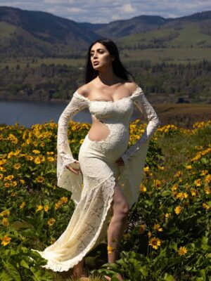 Parvati Melton Instagram - The hills, the blooms, the breeze… all keeping time with the tiny heartbeat I carry… 
Photographer @xnilasx Dress @dollskill 
Follow my new journey 🔜 @nurturedbyparvati 🧿🪬🙏