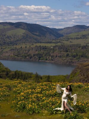 Parvati Melton Instagram - The hills, the blooms, the breeze… all keeping time with the tiny heartbeat I carry… 
Photographer @xnilasx Dress @dollskill 
Follow my new journey 🔜 @nurturedbyparvati 🧿🪬🙏